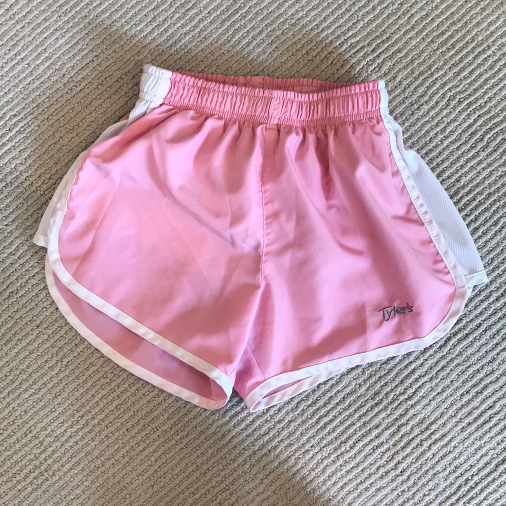 Pink Tyler’s Running Shorts.